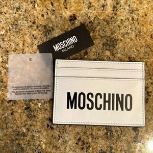 Moschino white leather black logo card holder. New, with tags.
